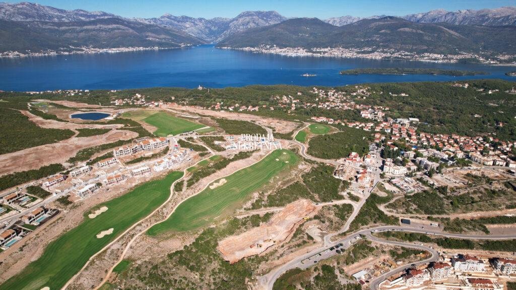 Drone footage of Lustica bay. Vast area, where just small part of it is built on, there is golf field, and a lot of untouched nature. There is also village Radovici beside.